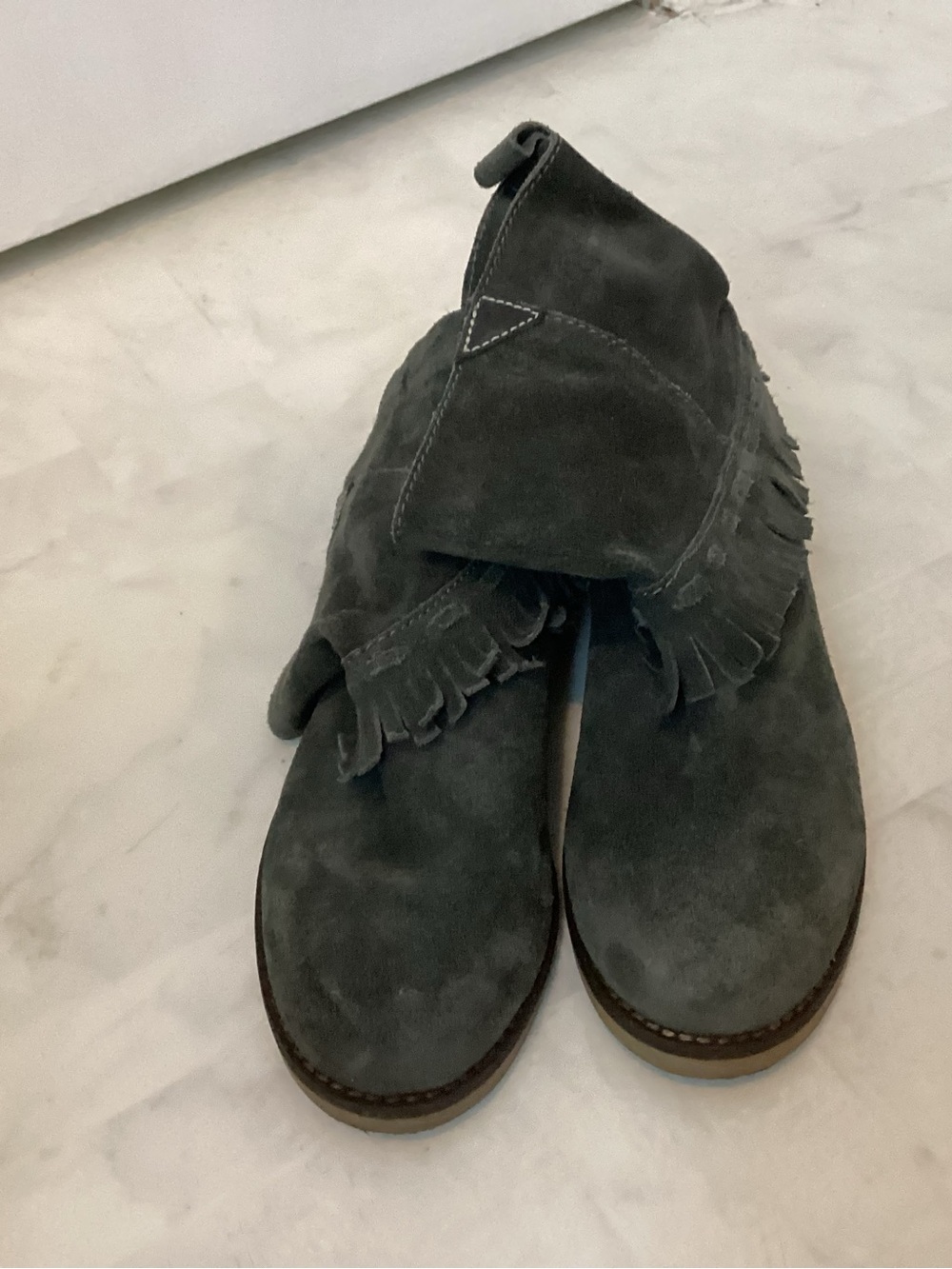 Coolway fringe boots.